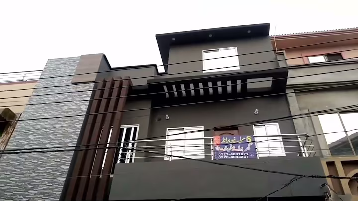 outside side view of the Newly constructed Home in Al kareem Garden Block C Phase 1 Lahore For sale