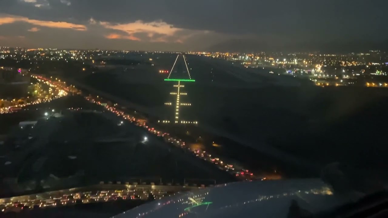 FOKKER F100 DURING APPROACH ON THE ILS RUNWAY 29LOF TEHRAN MEHRABAD AIRPORT AT DUSK.(OIII/THR)(2023)
