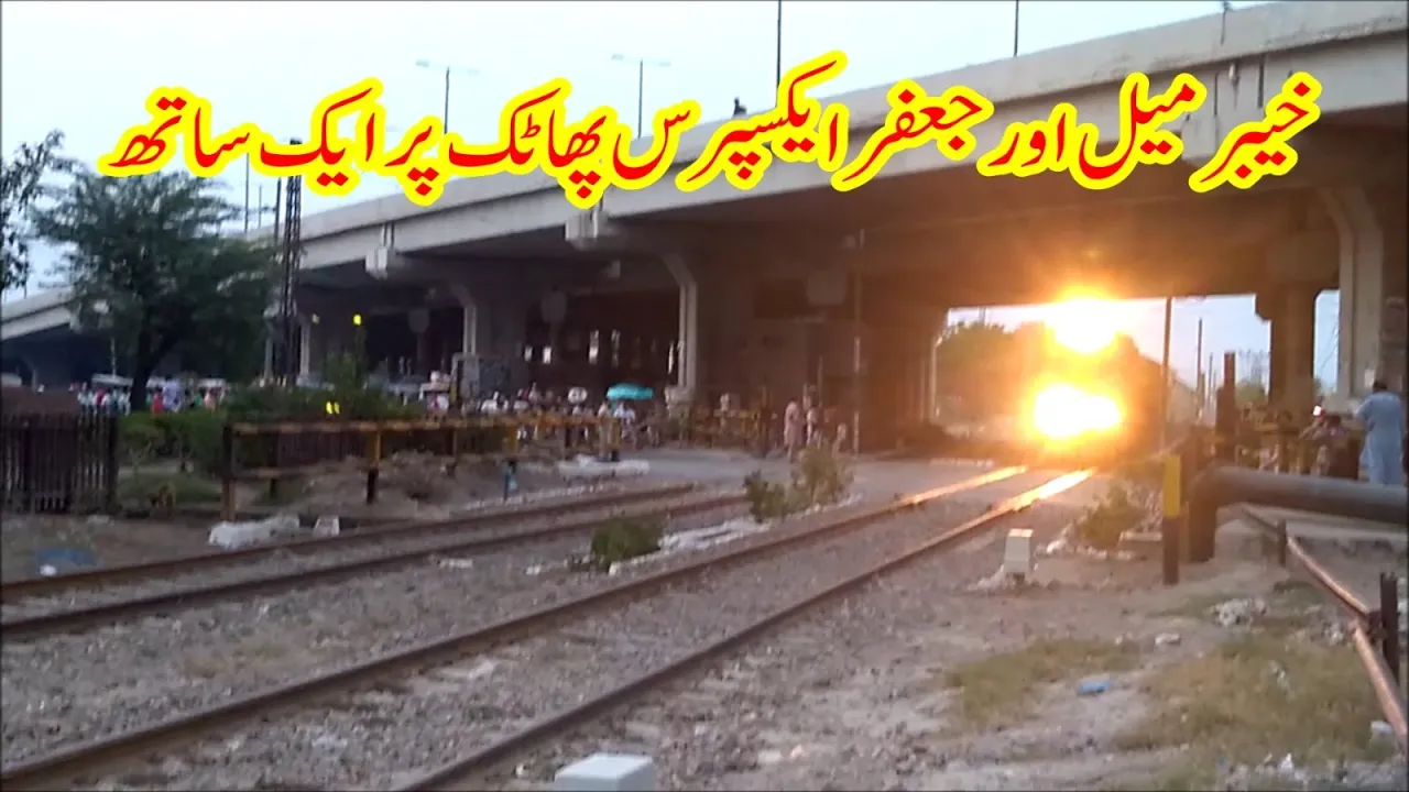 GE Locomotives hauling Khyber Mail & Jaffar Express Passing Ferozpur Road Level Crossing, Lahore