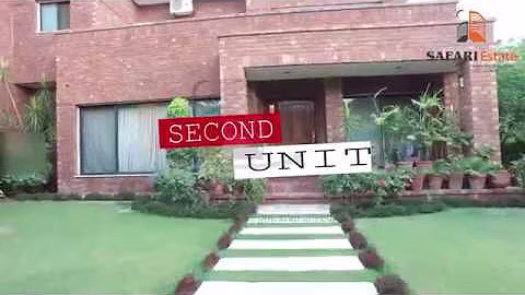 4 KANAL DUPLEX  BUNGALOW WITH LUSH GREEN HUGE LAWN IN GREEN FORT MAIN CANAL ROAD LAHORE.